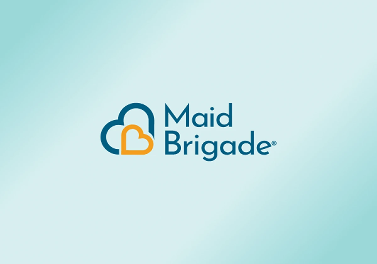 Maid Brigade Logo on a blue and white gradient background.
